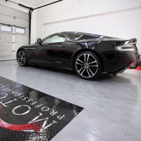 Aston Martin on a Diamond TuffShield® garage floor with a custom logo