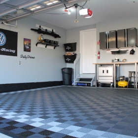 A clean garage with Graphite, Alloy, and Black Free-Flow