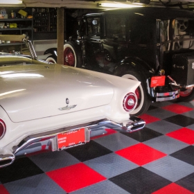 A garage with a Ford Thunderbird and RaceDeck XL