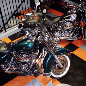 Two Harleys on Harley-Davidson garage flooring