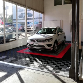 Volkswagen on Free-Flow flooring in a commercial garage