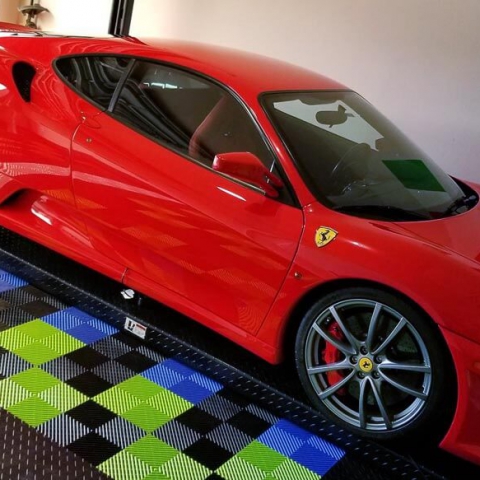 Ferrari on a lift with Free-Flow flooring