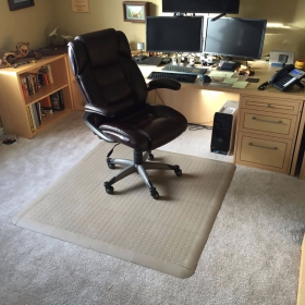 Beige CircleTrac and edging being used as an office chair mat.