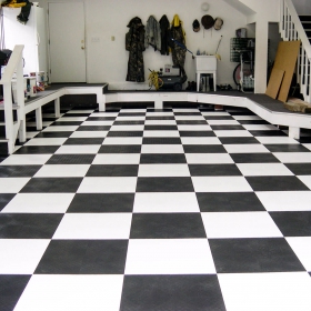 Basement area with checkered RaceDeck XL floor.
