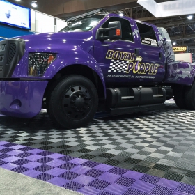 Royal purple car show display with matching Free-Flow portable floor