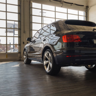Bentley Bentayga at the Luxe Auto Spa, floored with Smoked Oak.