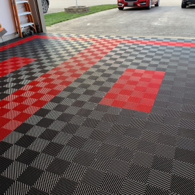 Empty 2-car garage with Free-Flow Graphite and Red flooring