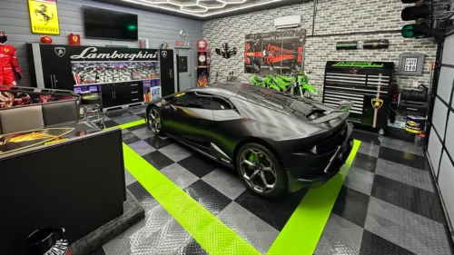 Lamborghini parked in a grage with Tuffshield tiles.