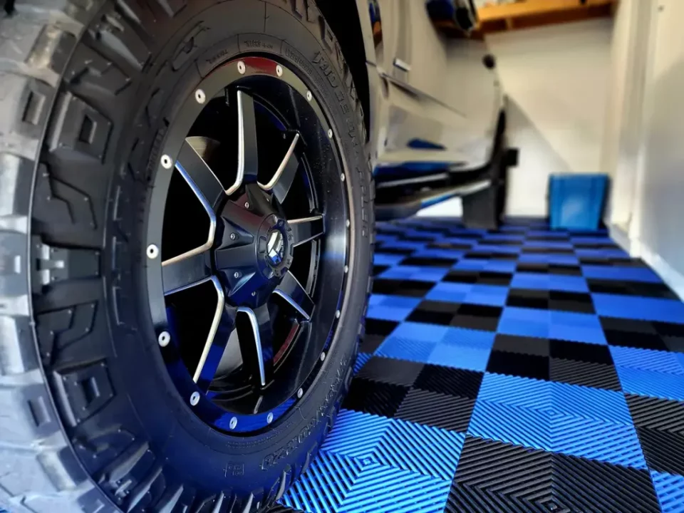 Truck parked on RaceDeck modular garage floor tiles
