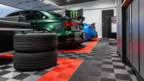 Two cars in a grage with Free-Flow garage floor tiles