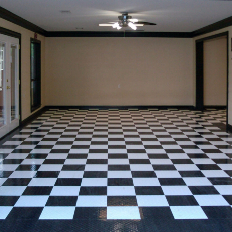 Checkered black and white RaceDeck Diamond flooring interior