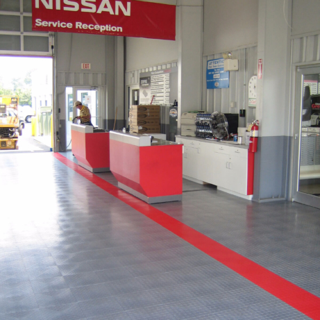 Nissan commercial garage with RaceDeck Diamond flooring