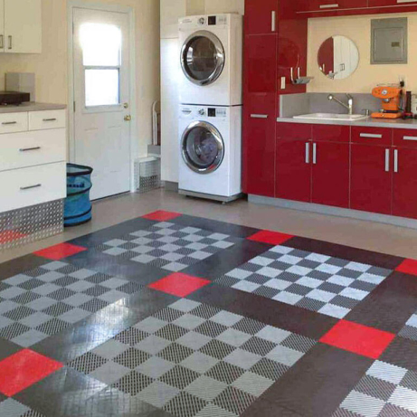Using Free-Flow flooring over a drain is a great idea in a space with a washer and sink.