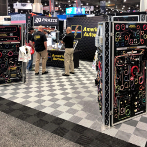 American Autowire booth with black and alloy Free-Flow flooring