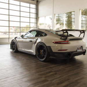 Porsche GT2 RS on Smoked Oak flooring At Luxe Auto Spa