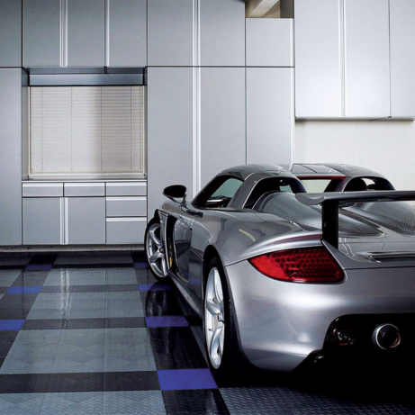 A garage with a Carrera GT and RaceDeck Diamond with TuffShield® gloss coating