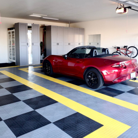 Mazda in a garage with CircleTrac alloy, black, and yellow flooring