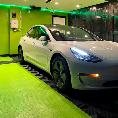 CircleTrac Sublime and Free-Flow Black green garage with Tesla