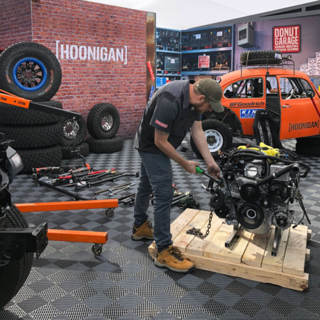 The Hoonigan booth with Racedeck flooring at SEMA