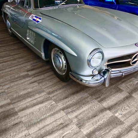 A garage with Smoked Oak and a Mercedes-Benz 300 SL gullwing.