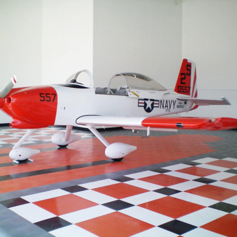 Airplane on RaceDeck Diamond flooring with red, white, black and graphite colors