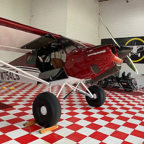 RaceDeck Diamond red and white in airplane hanger