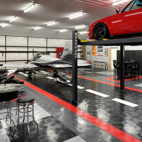 Alternate view of airplane hangar and garage with lift