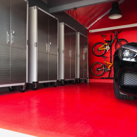A red garage with a Mercedes