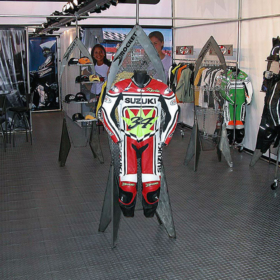 Racing gear retail space with RaceDeck Diamond graphite flooring.