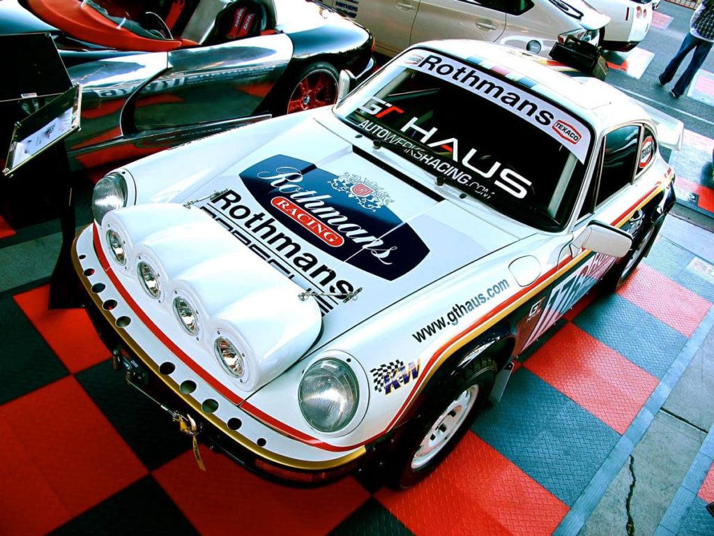 Rothmans Racing Porsche on display on RaceDeck Diamond garage tiles.