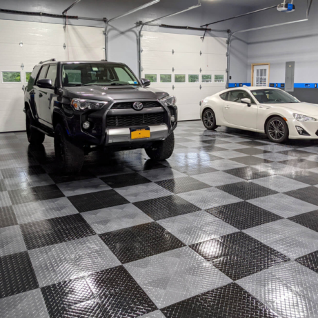 RaceDeck Tuffshield high-gloss flooring in this checkered garage