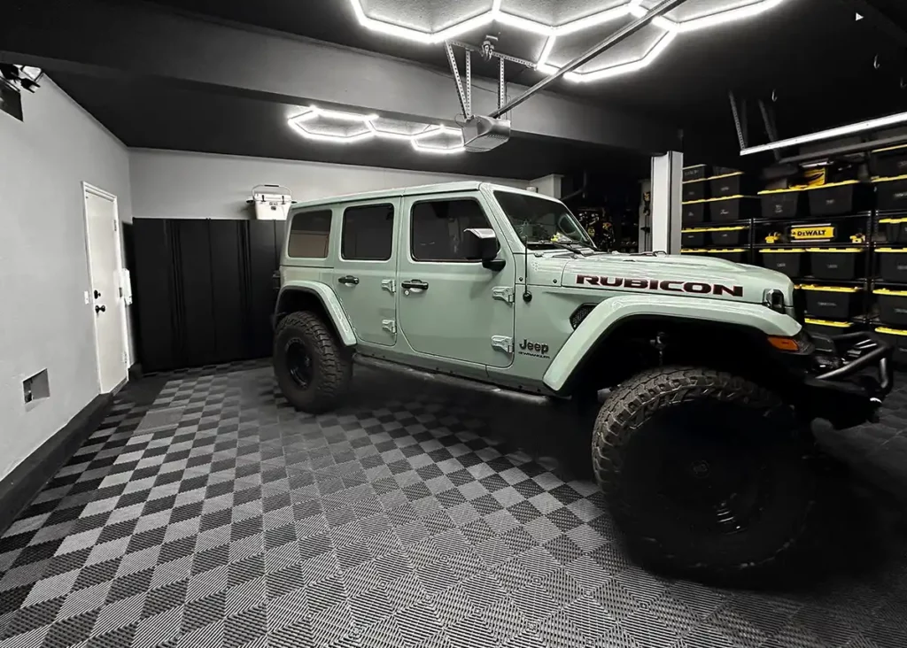 A Jeep Rubicon parked in a garage with Free-Flow garage flooring