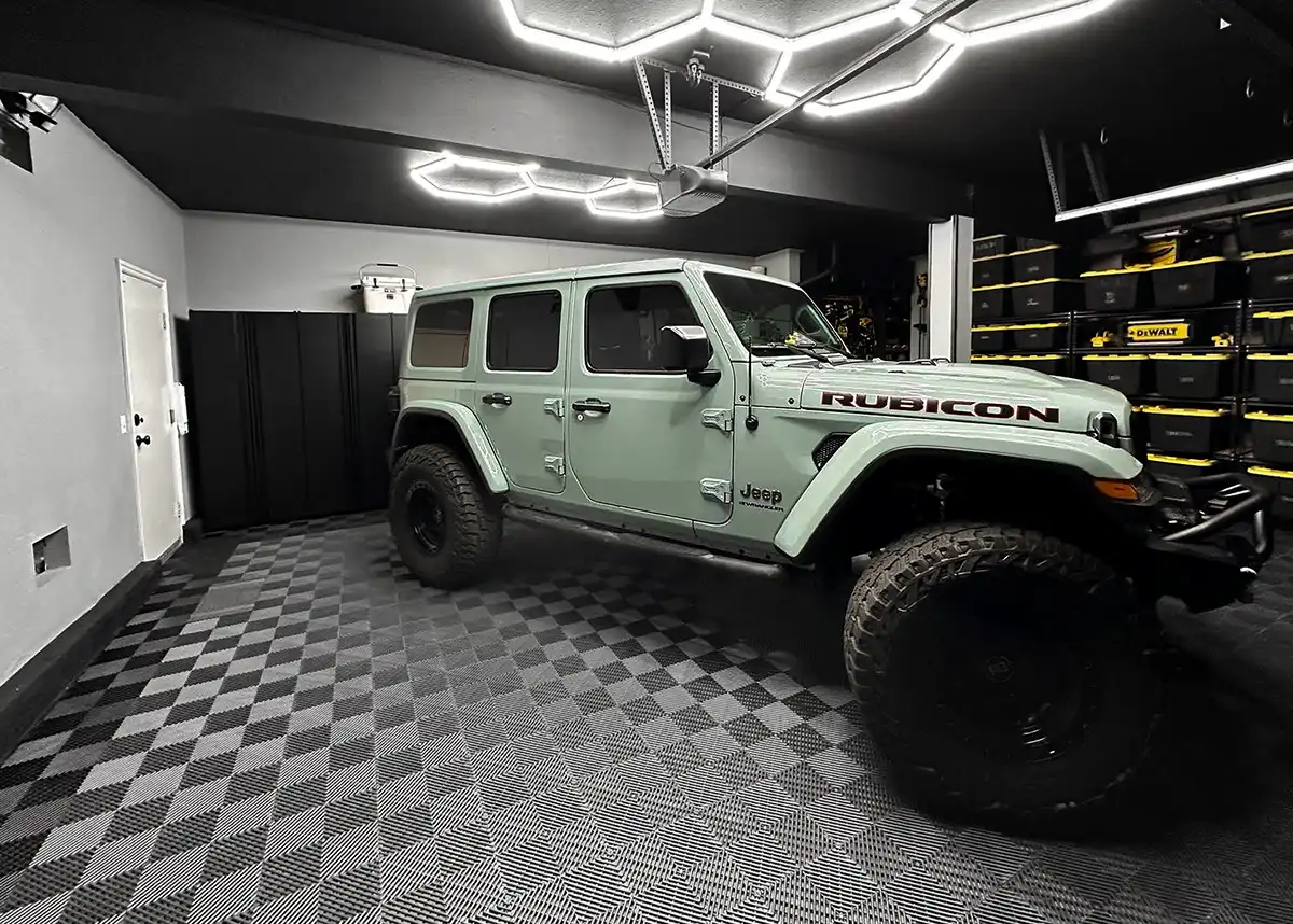 A Jeep Rubicon parked in a garage with Free-Flow garage flooring