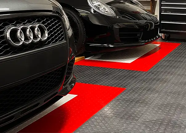 Audi and Porsche on CircleTrac garage tiles