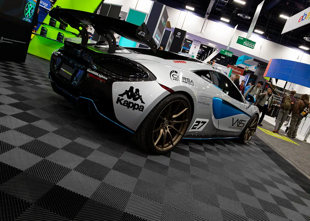 McLaren on RaceDeck XLC in a booth a the SEMA show.